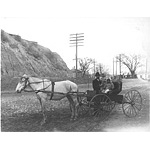 Father and 2 daughters with horse and buggy